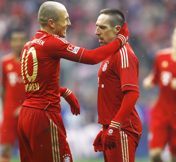 Franck Ribery of Bayern Munich with teammate Arjen Robben (left)