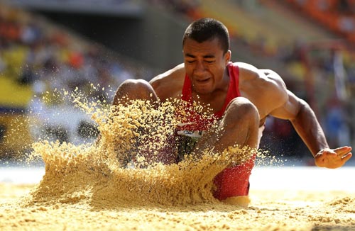 Ashton Eaton of the U.S. competes in the men's decathlon long jump event at the IAAF World Athletics Championships 
