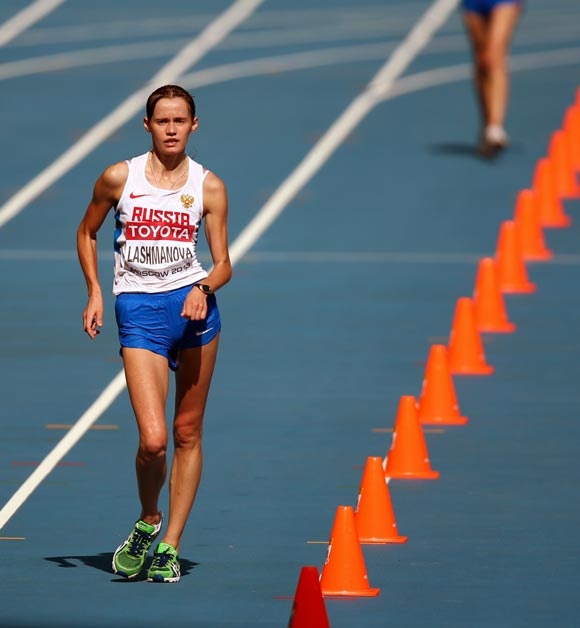 Elena Lashmanova of Russia heads towards the finish to win the gold in the women's 20-km race walk