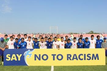 The India and Tajikistan team pose for a photograph before the matc