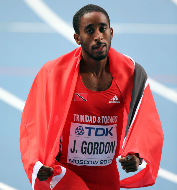 Jehue Gordon of Trinidad and Tobago celebrates winning gold in the Men's 400 metres hurdles