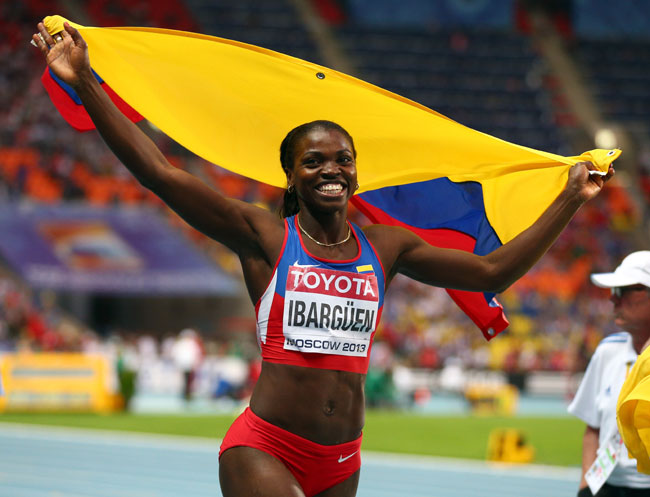 Caterine Ibarguen of Colombia celebrates winning gold in the Women's Triple Jump