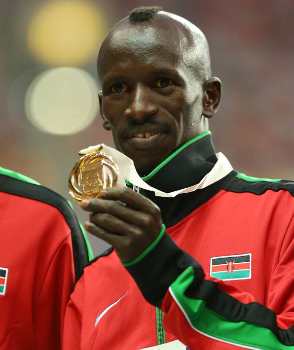 Gold medalist Ezekiel Kemboi of Kenya on the podium during the medal ceremony for the Men's 3000 metres steeplechase