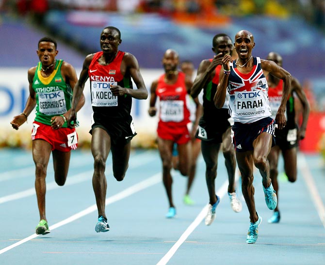 Mo Farah (right) of Great Britain in action in the men's 5000 metres