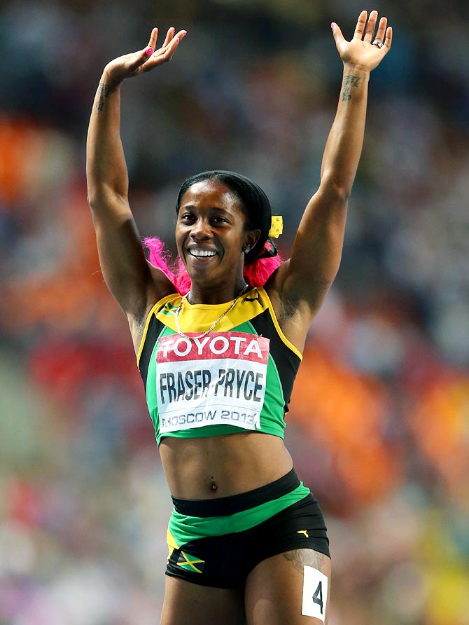Shelly-Ann Fraser-Pryce of Jamaica celebrates winning gold in the women's 200 metres