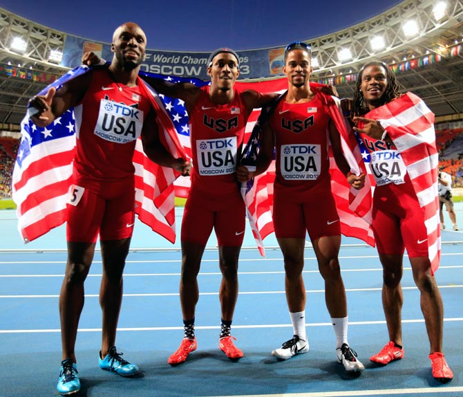 (Left to right): LaShawn Merritt,Tony McQuay, Arman Hall and David Verburg of the United States celebrate winning gold in the men's 4x400 metres relay final