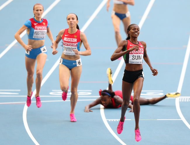 Eunice Jepkoech Sum of Kenya crosses the line to win gold ahead of Mariya Savinova of Russia in the Women's 800 metres final