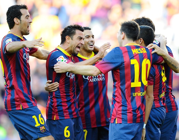 FC Barcelona players celebrate after Alexis Sanchez scored the opening goal