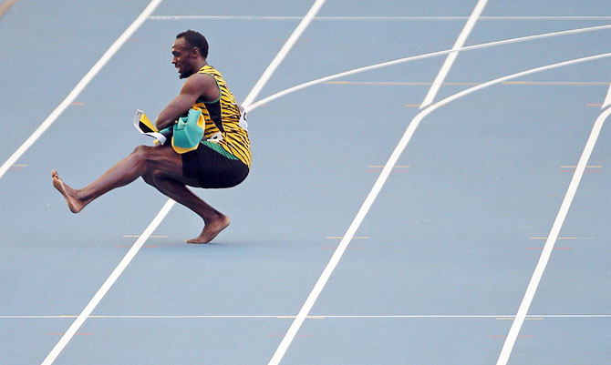 Usain Bolt does the dance after his victory on Sundauy
