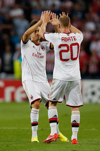 Stephan El Shaarawy (left) of AC Milan celebrates scoring the first goal of the match with team mate Ignazio Abate