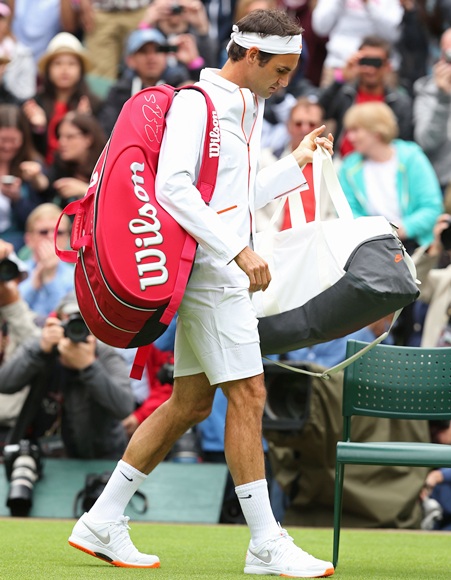 Roger Federer of Switzerland walks out