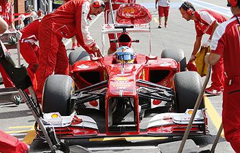 Ferrari Formula One driver Fernando Alonso of Spain makes a pit stop during the second practice session of the Belgian F1 Grand Prix at the Circuit of Spa-Francorchamps on Friday
