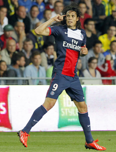 Paris Saint-Germain's Edinson Cavani celebrates after scoring against Nantes