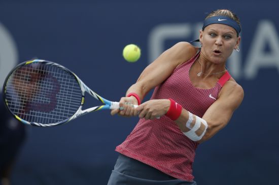 Lucie Safarova of the Czech Republic hits a return to Roberta Vinci of Italy at the U.S. Open 
