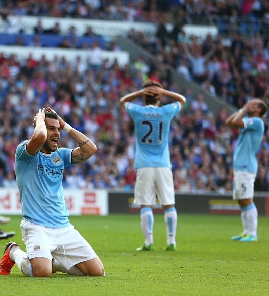 Alvaro Negredo of Manchester City and teammates react