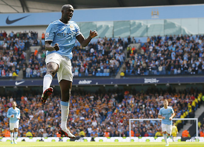 Manchester City's Yaya Toure celebrates after scoring the second goal against Hull City on Saturday