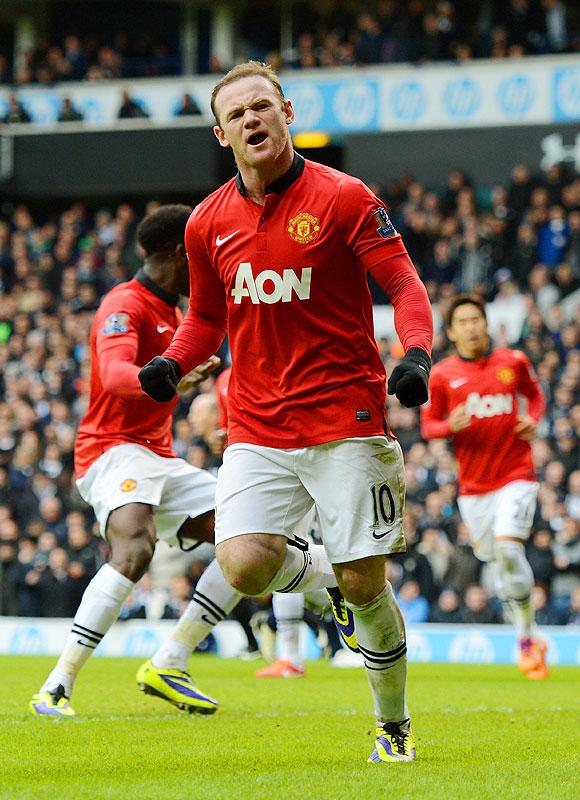 Manchester United's Wayne Rooney celebrates scoring their second goal from the   penalty spot against Tottenham Hotspur during   their Barclays Premier League match at White Hart Lane in London on Sunday