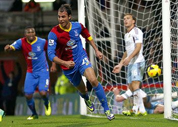 Crystal Palace's Marouane Chamakh (centre) scores a goal against West Ham during their English Premier League match at Selhurst Park in London on Tuesday