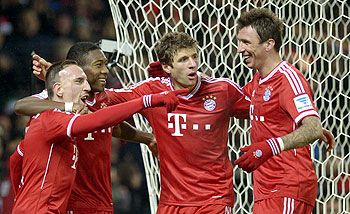 Bayern Munich's (L-R) Franck Ribery, David Alaba, Thomas Mueller and Mario Mandzukic celebrate after scoring against Werder Bremen on Saturday