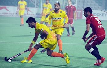India's captain Manpreet Singh in thick of action during the match against Canada