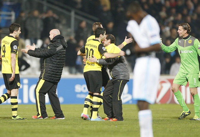 Borussia Dortmund players react after winning their Champions League match