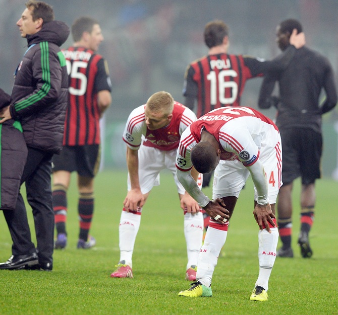 Ajax Amsterdam players dejected at the end of the UEFA Champions League Group H match against AC Milan