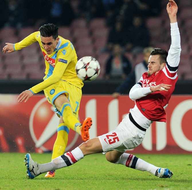 Jose Callejon of Napoli and Carl Jenkinson of Arsenal in action