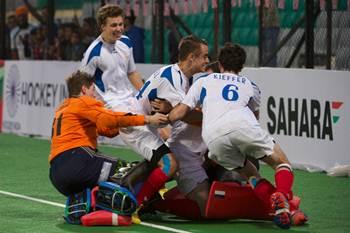 The French players celebrate after winning the penalty shoot-out