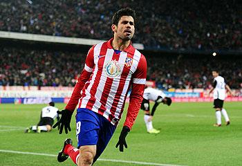 Diego Costa of Club of Atletico Madrid celebrates after scoring agianst Valencia during their La Liga match at Vicente Calderon Stadium in Madrid on Sunday