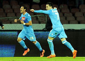 Blerim Dzemaili (L) of Napoli celebrates after scoring against Inter Milan during their Serie A match at Stadio San Paolo in Naples, Italy on Sunday