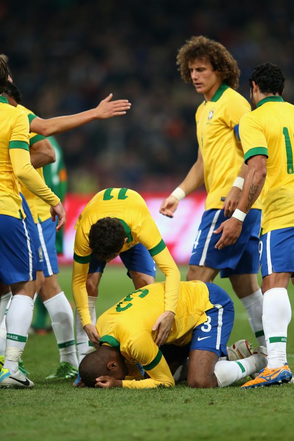 Brazilian players celebrate after scoring a goal