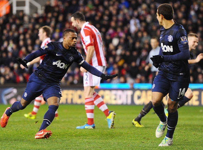 Patrice Evra of Manchester United celebrates scoring his team's second goal
