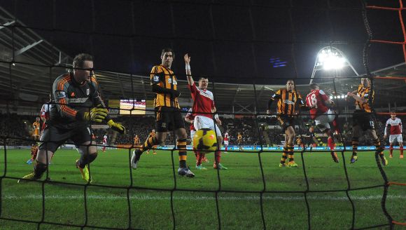 Hull City's Matty Fryatt (2nd R) shoots to score against Fulham during their English Premier League soccer match at The KC Stadium in Hull