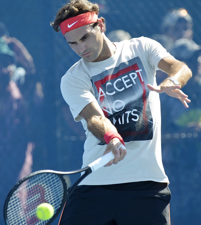 Roger Federer of Switzerland plays a forehand