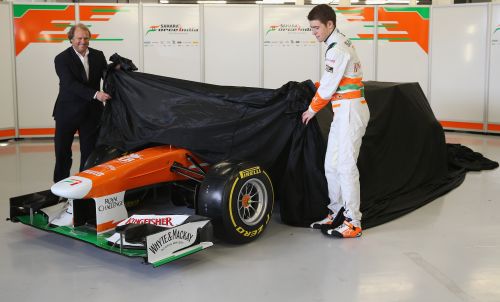Sahara Force India Formula 1 driver Paul Di Resta of Great Britain and deputy team principal Robert Fearnley unveil the team's new car