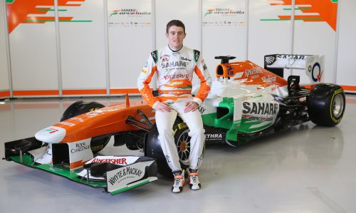 Sahara Force India Formula 1 driver Paul Di Resta of Great Britain with the team's new car for the 2013 Formula 1 season