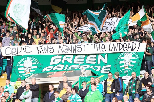 Celtic fans display a banner