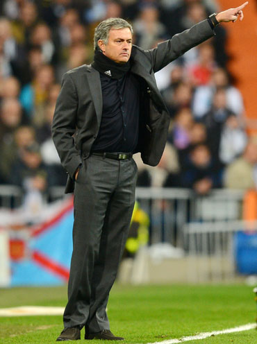 Head Coach Jose Mourinho of Real Madrid gestures during the UEFA Champions League Round of 16 first leg match against Manchester United