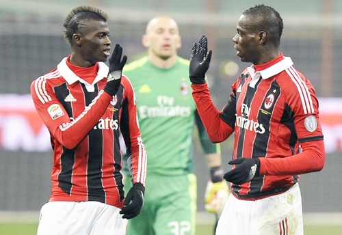 AC Milan's Mario Balotelli (right) with teammate Niang