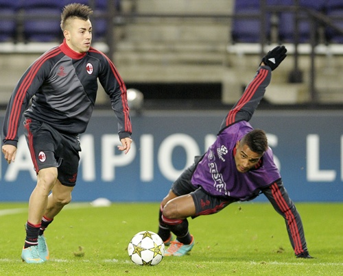 AC Milan players Stephan El Shaarawy and Kevin-Prince Boateng (right)