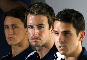 James Magnussen (centre) sits with teammates Cameron McEvoy (left) and Eamon Sullivan from Australia's 4x100m freestyle relay team at the London Olympic Games during a media conference at a hotel in Sydney on Friday