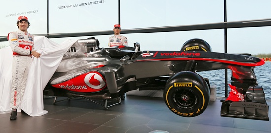 McLaren Formula One drivers Sergio Perez (left) and Jenson Button