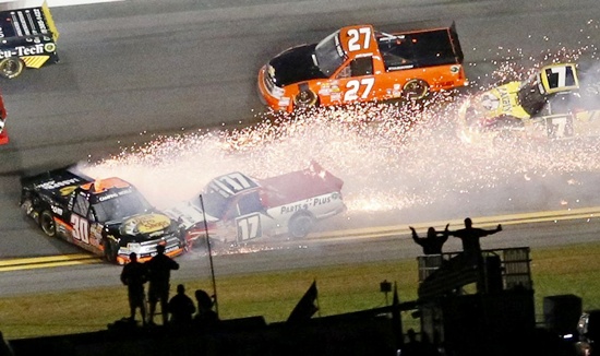 Sparks fly from Ryan Truex in his number 30 Chevrolet (left)