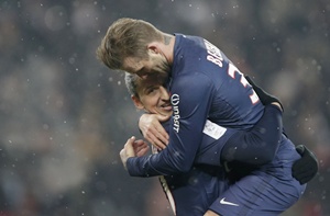Paris Saint-Germain's David Beckham (right) congratulates Zlatan Ibrahimovic