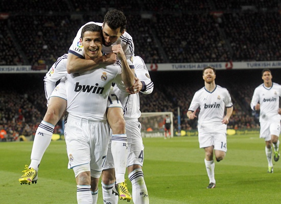 Real Madrid's Cristiano Ronaldo (left) is congratulated by teammate Alvaro Arbeloa