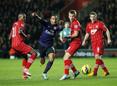 Arsenal's Theo Walcott breaks through the Southampton defence