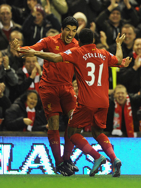 Liverpool's Luis Suarez and Raheem Sterling celebrate after scoring against Sunderland during their English Premier League match on Wednesday