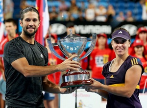 Fernando Verdasco and Anabel Medina Garrigues of Spain pose with the trophy