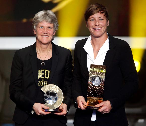 Pia Sundhage (left) with Abby Wambach