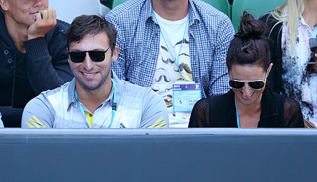 Former Australian Olympic swimmer Ian Thorpe (left) watches the match between compatriot Samantha Stosur and  Chang Kai-chen of Taiwan on Monday